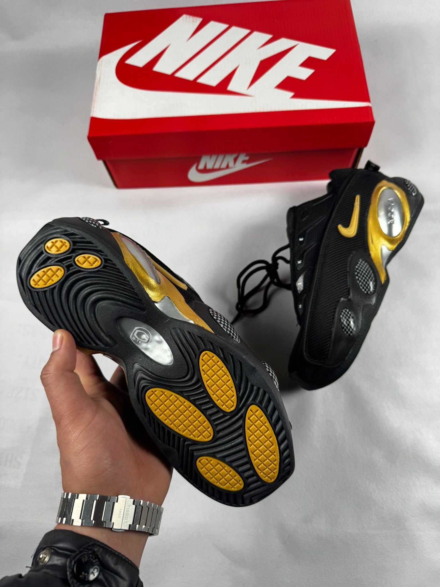 Nike NOCTA Glide BLACK UNIVERSITY GOLD