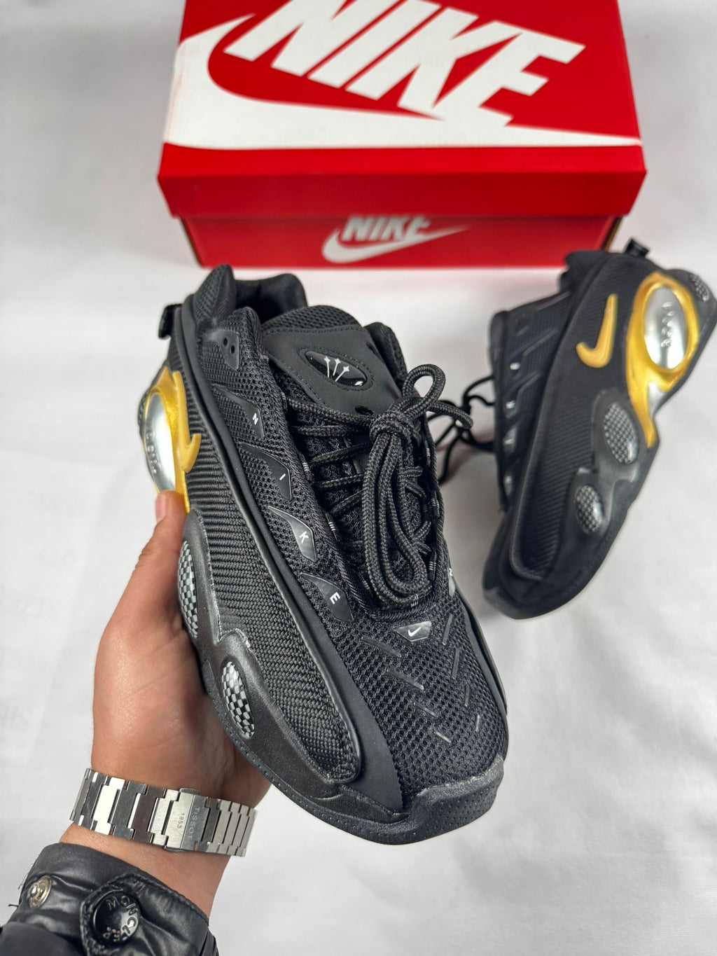 Nike NOCTA Glide BLACK UNIVERSITY GOLD